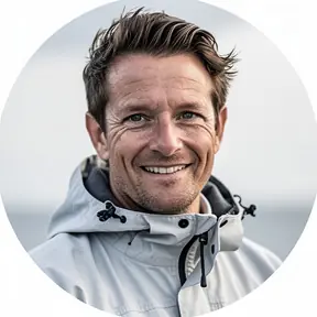 Circular portrait photo of a friendly boat guide wearing a light windbreaker, natural smile, soft daylight, clean background, realistic, high detail, no text, no logo
